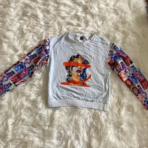 Women’s graphic long sleeve shirt from SHEIN.  Only worn once.